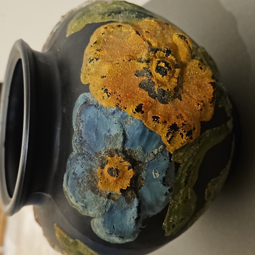 TIFFIN Black Amethyst Satin Glass Poppy Vase with raised molded flowers .
